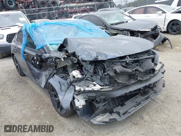 ✅ 2023 Honda Civic Sport • VIN: 2HGFE2F56PH521743 • Lot: 42205210. Listed on IAAI with 31,462 mi. Free auction sales archive from the USA and detailed vehicle history report at DreamBid. Image 1.