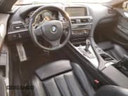 ✅ 2013 BMW 6 Series 650i • VIN: WBAYM9C59DDW20361 • Лот: 79741594. Опубликован ранее на Copart с пробегом 86 948 миль. Бесплатный доступ к архиву аукционных продаж из США и подробный отчёт об истории автомобиля на DreamBid. Изображение 8.