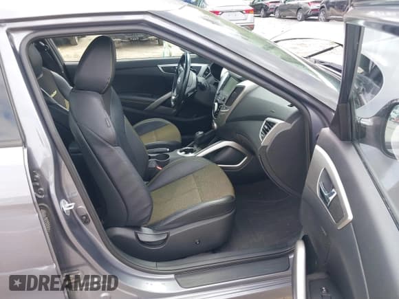 ✅ 2016 Hyundai Veloster • VIN: KMHTC6AD1GU248362 • Lot: 43031171. Listed on IAAI with 51,650 mi. Free auction sales archive from the USA and detailed vehicle history report at DreamBid. Image 5.