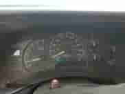 2002 GMC Sierra 1500 with VIN 1GTEC14W72Z334848, listed as a Copart auction lot 59733325 with 213,155 mi miles and Salvage title. Bid and sale history available at DreamBid. Image 9.