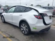 ✅ 2023 Tesla Model Y Long Range • VIN: 7SAYGAEE9PF702910 • Lot: 42199519. Wystawiony na IAAI z przebiegiem 91 094 mil. Bezpłatny archiwum sprzedaży aukcyjnych z USA i szczegółowy raport historii pojazdu na DreamBid. Zdjęcie 3.