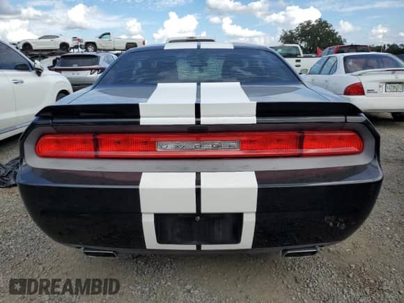 2012 Dodge Challenger SXT z VIN 2C3CDYAG3CH158140, wystawiony jako Copart lot #74021374 z przebiegiem Nie podano mil oraz Szkoda całkowita • Salvage title. Historia ofert i sprzedaży dostępna na DreamBid. Obrazek 6.