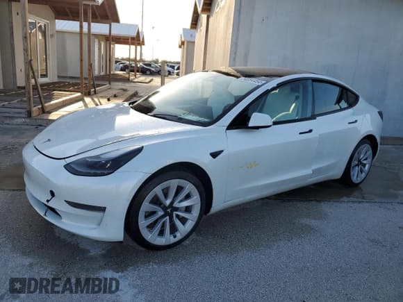 ✅ 2022 Tesla Model 3 Long Range • VIN: 5YJ3E1EBXNF181454 • Лот: 74084454. Опубликован ранее на Copart с пробегом Не указан. Бесплатный доступ к архиву аукционных продаж из США и подробный отчёт об истории автомобиля на DreamBid. Изображение 1.