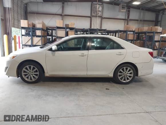 2013 Toyota Camry L with VIN 4T4BF1FK9DR293452, listed as a IAAI auction lot 42876325 with 225,034 mi miles and . Bid and sale history available at DreamBid. Image 14.