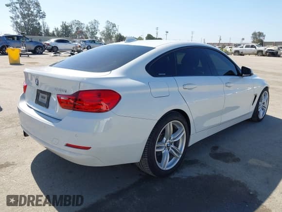 ✅ 2015 BMW 4 Series 428i • VIN: WBA4A9C50FGL85857 • Lot: 42542619. Listed on IAAI with 136,411 mi. Free auction sales archive from the USA and detailed vehicle history report at DreamBid. Image 4.