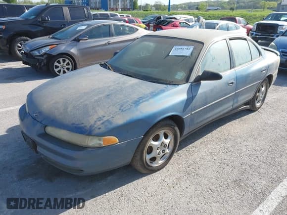 ✅ 1998 Oldsmobile Intrigue GX • VIN: 1G3WH52KXWF393882 • Lot: 42056782. Listed on IAAI with 223,763 mi. Free auction sales archive from the USA and detailed vehicle history report at DreamBid. Image 2.
