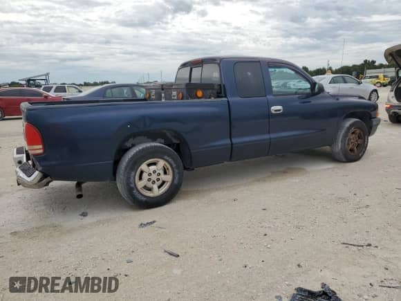 2001 Dodge Dakota с VIN 1B7GL22X61S344255, выставлен на аукционе Copart как лот 72901294 с пробегом 155 828 миль миль и Списание • Salvage title. История ставок и продаж доступна на DreamBid. Изображение 3.