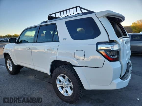 ✅ 2021 Toyota 4Runner SR5 • VIN: JTEMU5JR6M5969757 • Lot: 82510515. Listed on Copart with 48,815 mi. Free auction sales archive from the USA and detailed vehicle history report at DreamBid. Image 2.