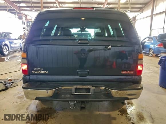 ✅ 2005 GMC Yukon SLT • VIN: 1GKEK13Z65J251160 • Lot: 95345875. Wystawiony na Copart z przebiegiem 186 219 mil. Bezpłatny archiwum sprzedaży aukcyjnych z USA i szczegółowy raport historii pojazdu na DreamBid. Zdjęcie 6.