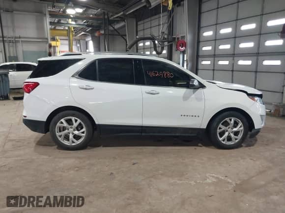 2018 Chevrolet Equinox Premier с VIN 3GNAXPEU1JS542875, выставлен на аукционе IAAI как лот 41629880 с пробегом 159 870 миль миль и . История ставок и продаж доступна на DreamBid. Изображение 13.
