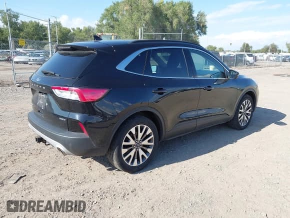 ✅ 2020 Ford Escape Titanium Hybrid • VIN: 1FMCU9DZ3LUB00519 • Lot: 43248505. Wystawiony na IAAI z przebiegiem 74 149 mil. Bezpłatny archiwum sprzedaży aukcyjnych z USA i szczegółowy raport historii pojazdu na DreamBid. Zdjęcie 4.