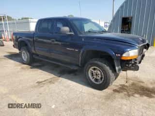 2000 Dodge Dakota Sport z VIN 1B7GG2AN8YS665678, wystawiony jako Copart lot #63878554 z przebiegiem 92 470 mil mil oraz Szkoda całkowita • Salvage title. Historia ofert i sprzedaży dostępna na DreamBid. Obrazek 4.