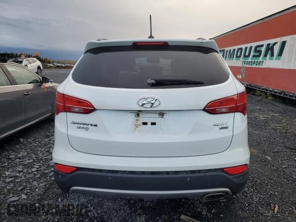 ✅ 2014 Hyundai Santa Fe • VIN: 5XYZUDLB8EG159107 • Lot: 89474465. Listed on Copart with 135,472 mi. Free auction sales archive from the USA and detailed vehicle history report at DreamBid. Image 6.