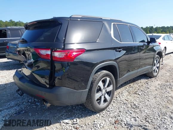 ✅ 2021 Chevrolet Traverse LT • VIN: 1GNERHKW4MJ260176 • Lot: 43343332. Wystawiony na IAAI z przebiegiem 126 672 mil. Bezpłatny archiwum sprzedaży aukcyjnych z USA i szczegółowy raport historii pojazdu na DreamBid. Zdjęcie 4.