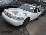 ✅ 2005 Ford Police Interceptor • VIN: 2FAFP71W75X120703 • Lot: 41256222. Listed on IAAI with 208,095 mi. Free auction sales archive from the USA and detailed vehicle history report at DreamBid. Image 2.