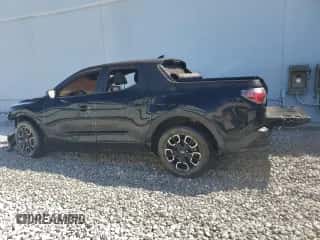 2022 Hyundai Santa Cruz SEL с VIN 5NTJBDAEXNH009154, выставлен на аукционе Copart как лот 82161934 с пробегом Не указан миль и Списание • Salvage title. История ставок и продаж доступна на DreamBid. Изображение 2.