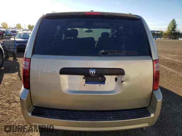 ✅ 2010 Dodge Grand Caravan SE • VIN: 2D4RN4DE8AR255706 • Лот: 82090695. Опубликован ранее на Copart с пробегом 287 251 миль. Бесплатный доступ к архиву аукционных продаж из США и подробный отчёт об истории автомобиля на DreamBid. Изображение 6.