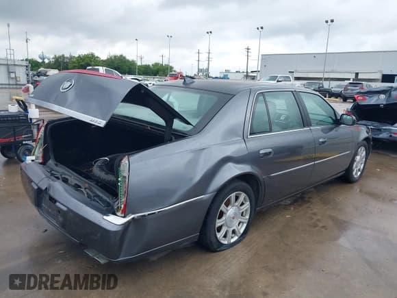 ✅ 2009 Cadillac DTS 1SA • VIN: 1G6KD57Y79U110350 • Lot: 42082318. Listed on IAAI with 94,369 mi. Free auction sales archive from the USA and detailed vehicle history report at DreamBid. Image 4.