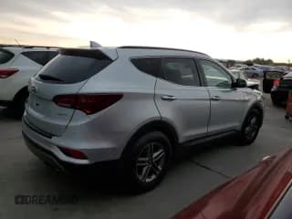 ✅ 2017 Hyundai Santa Fe 2.4L • VIN: 5XYZU3LB2HG451169 • Лот: 54615084. Опубликован ранее на Copart с пробегом 87 202 миль. Бесплатный доступ к архиву аукционных продаж из США и подробный отчёт об истории автомобиля на DreamBid. Изображение 3.