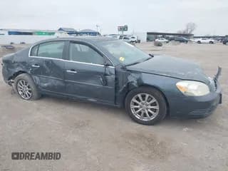 ✅ 2009 Buick Lucerne CXL-5 • VIN: 1G4HD57M59U107883 • Лот: 41441995. Опубликован ранее на IAAI с пробегом 163 061 миль. Бесплатный доступ к архиву аукционных продаж из США и подробный отчёт об истории автомобиля на DreamBid. Изображение 1.