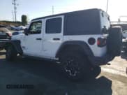 ✅ 2021 Jeep Wrangler Unlimited Sport Altitude • VIN: 1C4HJXDG5MW737438 • Lot: 69209575. Listed on Copart with 76,202 mi. Free auction sales archive from the USA and detailed vehicle history report at DreamBid. Image 2.