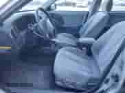 2005 Hyundai Elantra GLS z VIN KMHDN46D65U043418, wystawiony jako Copart lot #74710674 z przebiegiem 243 165 mil mil oraz Czysty tytuł • Clean title. Historia ofert i sprzedaży dostępna na DreamBid. Obrazek 7.