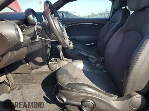 ✅ 2012 MINI Coupe • VIN: WMWSX1C58CT507178 • Lot: 82726785. Wystawiony na Copart z przebiegiem 146 408 mil. Bezpłatny archiwum sprzedaży aukcyjnych z USA i szczegółowy raport historii pojazdu na DreamBid. Zdjęcie 7.