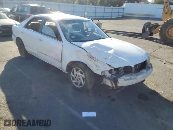 ✅ 1999 Mazda 626 LX • VIN: 1YVGF22D4X5882600 • Lot: 69031604. Wystawiony na Copart z przebiegiem Nie podano. Bezpłatny archiwum sprzedaży aukcyjnych z USA i szczegółowy raport historii pojazdu na DreamBid. Zdjęcie 4.