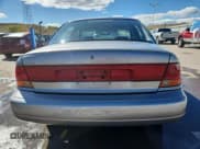 ✅ 1999 Saturn SL • VIN: 1G8ZK5270XZ150067 • Lot: 86307625. Wystawiony na Copart z przebiegiem 182 675 mil. Bezpłatny archiwum sprzedaży aukcyjnych z USA i szczegółowy raport historii pojazdu na DreamBid. Zdjęcie 6.