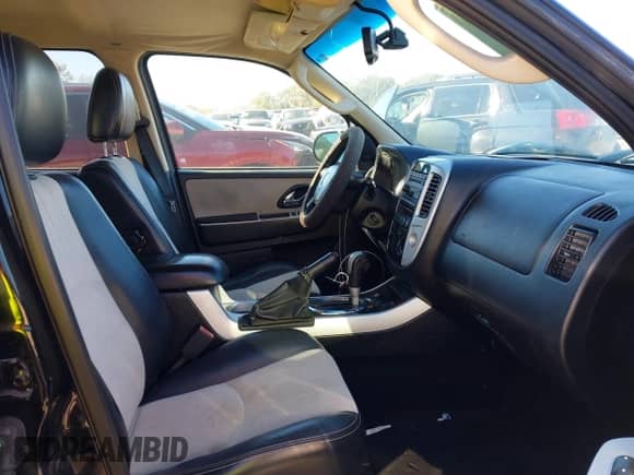 2007 Mercury Mariner Premier с VIN 4M2CU97127KJ20444, выставлен на аукционе IAAI как лот 40810464 с пробегом 163 702 миль миль и . История ставок и продаж доступна на DreamBid. Изображение 5.