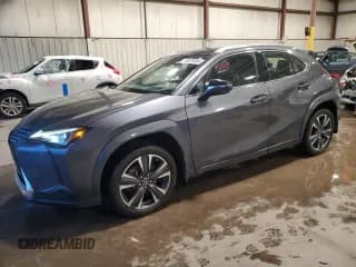 ✅ 2023 Lexus UX 250h Premium • VIN: JTHP9JBH8P2068542 • Lot: 93529995. Listed on Copart with 21,892 mi. Free auction sales archive from the USA and detailed vehicle history report at DreamBid. Image 1.