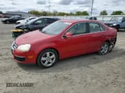 ✅ 2009 Volkswagen Jetta SE • VIN: 3VWRZ71K49M096874 • Lot: 52187665. Listed on Copart with 108,889 mi. Free auction sales archive from the USA and detailed vehicle history report at DreamBid. Image 1.