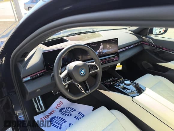 ✅ 2024 BMW i5 eDrive40 • VIN: WBY33FK03RCR31834 • Lot: 76007834. Listed on Copart with 60 mi. Free auction sales archive from the USA and detailed vehicle history report at DreamBid. Image 9.