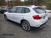 ✅ 2014 BMW X1 sDrive28i • VIN: WBAVM1C50EVW49666 • Lot: 43548180. Listed on IAAI with 63,964 mi. Free auction sales archive from the USA and detailed vehicle history report at DreamBid. Image 3.