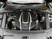 ✅ 2015 Audi A8 4.0T • VIN: WAU32AFD9FN024894 • Lot: 91904645. Wystawiony na Copart z przebiegiem 133 382 mil. Bezpłatny archiwum sprzedaży aukcyjnych z USA i szczegółowy raport historii pojazdu na DreamBid. Zdjęcie 7.