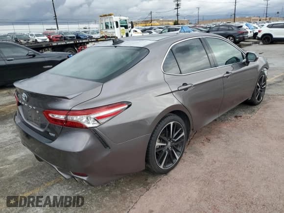 ✅ 2019 Toyota Camry XSE • VIN: 4T1B61HK5KU821704 • Lot: 93124685. Listed on Copart with 23,691 mi. Free auction sales archive from the USA and detailed vehicle history report at DreamBid. Image 3.