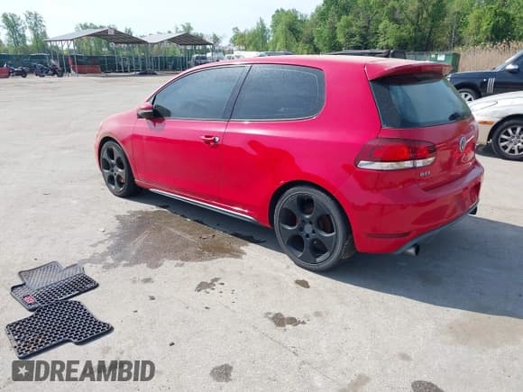 ✅ 2012 Volkswagen Golf GTI w/Conv & Sunroof • VIN: WVWEV7AJ2CW259338 • Lot: 42123333. Listed on IAAI with 121,365 mi. Free auction sales archive from the USA and detailed vehicle history report at DreamBid. Image 3.