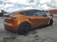 ✅ 2022 Tesla Model Y Performance • VIN: 7SAYGDEF4NF529899 • Lot: 89920025. Listed on Copart with 60,303 mi. Free auction sales archive from the USA and detailed vehicle history report at DreamBid. Image 3.