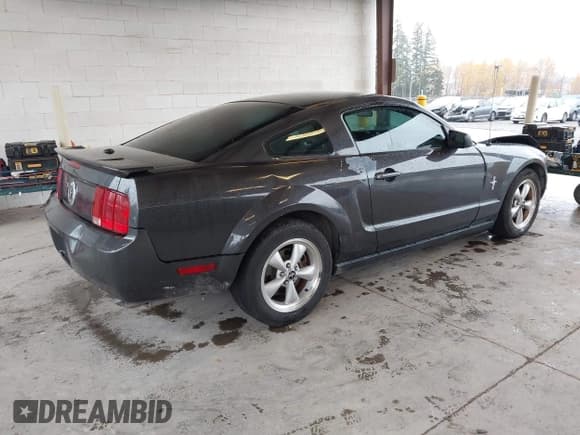 ✅ 2007 Ford Mustang Deluxe • VIN: 1ZVHT80NX75349309 • Lot: 43716028. Listed on IAAI with 148,642 mi. Free auction sales archive from the USA and detailed vehicle history report at DreamBid. Image 4.