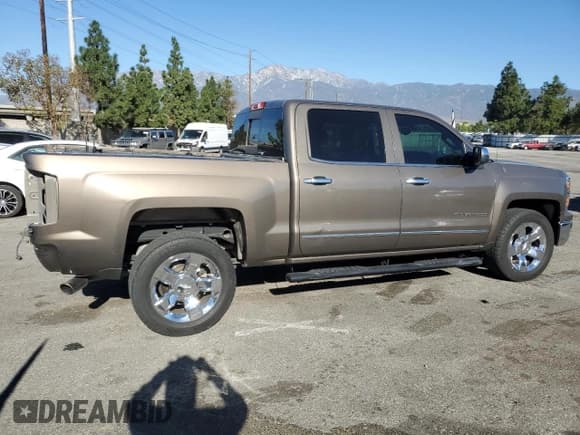 ✅ 2015 Chevrolet Silverado 1500 LTZ • VIN: 3GCPCSEC3FG400563 • Лот: 82858034. Опубликован ранее на Copart с пробегом 89 734 миль. Бесплатный доступ к архиву аукционных продаж из США и подробный отчёт об истории автомобиля на DreamBid. Изображение 3.