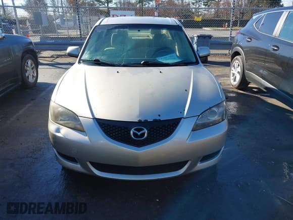 ✅ 2005 Mazda 3 i • VIN: JM1BK12F951314175 • Лот: 41097728. Опубликован ранее на IAAI с пробегом 243 085 миль. Бесплатный доступ к архиву аукционных продаж из США и подробный отчёт об истории автомобиля на DreamBid. Изображение 11.