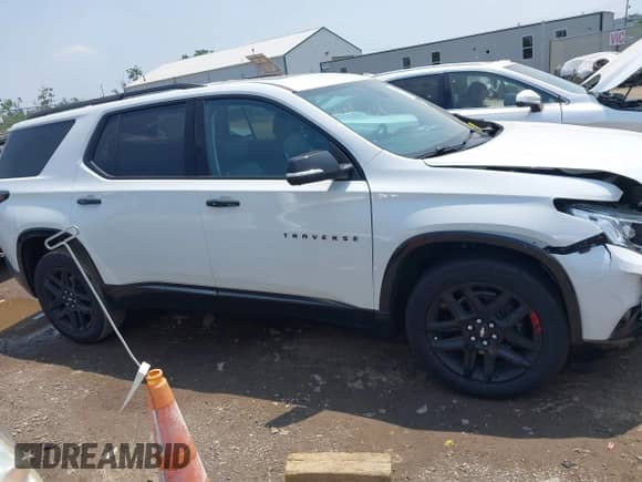 2021 Chevrolet Traverse Premier z VIN 1GNERKKW9MJ224531, wystawiony jako IAAI lot #42418665 z przebiegiem 49 188 mil mil oraz . Historia ofert i sprzedaży dostępna na DreamBid. Obrazek 13.