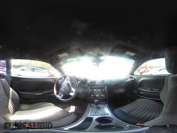 2014 Dodge Challenger SXT 100th Anniversary with VIN 2C3CDYAG0EH285477, listed as a IAAI auction lot 42298675 with 128,684 mi miles and . Bid and sale history available at DreamBid. Image 18.