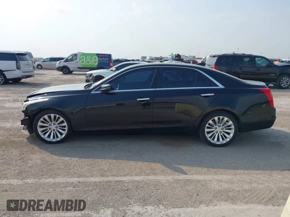 ✅ 2015 Cadillac CTS Luxury RWD • VIN: 1G6AR5SX2F0141438 • Lot: 43004019. Listed on IAAI with 143,885 mi. Free auction sales archive from the USA and detailed vehicle history report at DreamBid. Image 15.