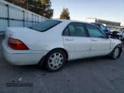 ✅ 2000 Acura RL • VIN: JH4KA9658YC006540 • Lot: 83498664. Listed on Copart with 188,589 mi. Free auction sales archive from the USA and detailed vehicle history report at DreamBid. Image 3.