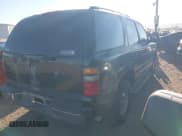 ✅ 2003 Chevrolet Tahoe LT • VIN: 1GNEC13T13J123207 • Lot: 43555952. Listed on IAAI with 128,284 mi. Free auction sales archive from the USA and detailed vehicle history report at DreamBid. Image 4.