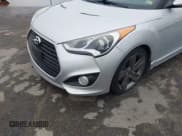 ✅ 2014 Hyundai Veloster Turbo • VIN: KMHTC6AE5EU198135 • Lot: 42236953. Wystawiony na IAAI z przebiegiem 163 139 mil. Bezpłatny archiwum sprzedaży aukcyjnych z USA i szczegółowy raport historii pojazdu na DreamBid. Zdjęcie 6.