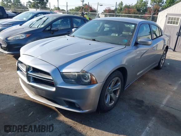 ✅ 2014 Dodge Charger RT • VIN: 2C3CDXCT9EH171742 • Lot: 43012411. Listed on IAAI with 256,632 mi. Free auction sales archive from the USA and detailed vehicle history report at DreamBid. Image 17.