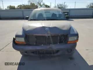 ✅ 2003 Dodge Dakota • VIN: 1D7FL16X13S189963 • Лот: 77114344. Размещён на Copart с пробегом 100 127 миль миль. Получите бесплатный доступ к архиву аукционных продаж из США и посмотрите подробный отчёт об истории автомобиля на DreamBid. Изображение 5.