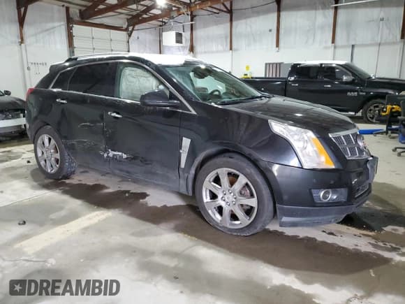 ✅ 2012 Cadillac SRX Premium Collection • VIN: 3GYFNFE31CS653641 • Lot: 38424094. Wystawiony na Copart z przebiegiem 100 677 mil. Bezpłatny archiwum sprzedaży aukcyjnych z USA i szczegółowy raport historii pojazdu na DreamBid. Zdjęcie 4.
